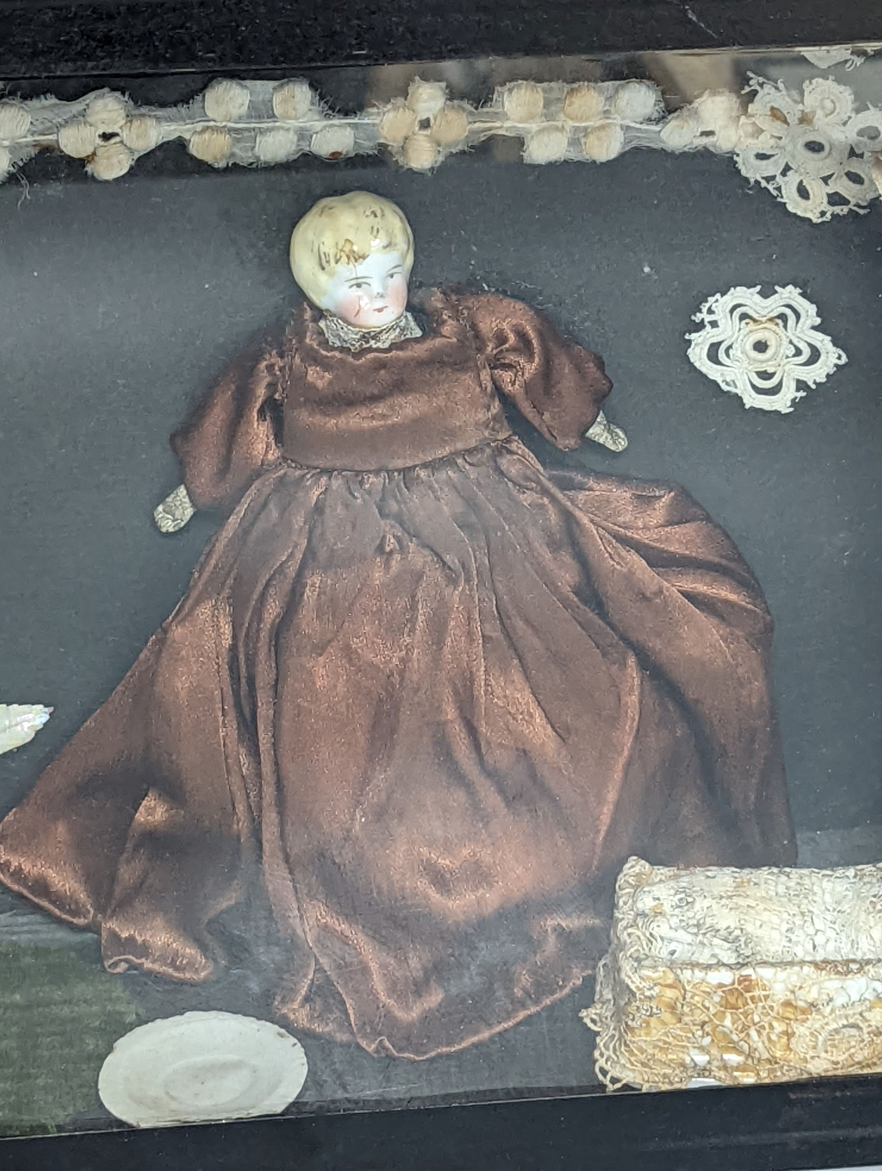 A Diorama, interior scene of Victorian dolls and objects, 38 cm wide